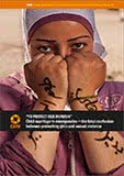 Syrian girl with writing on her arms.